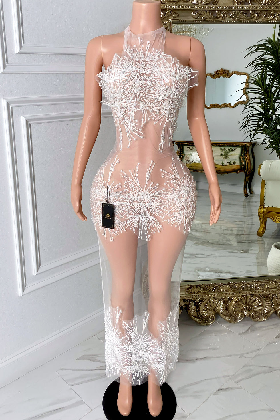 Front view of the Alley White Firework Mesh Dress featuring a high neckline, sheer mesh fabric, and white pearl firework-inspired embellishments.