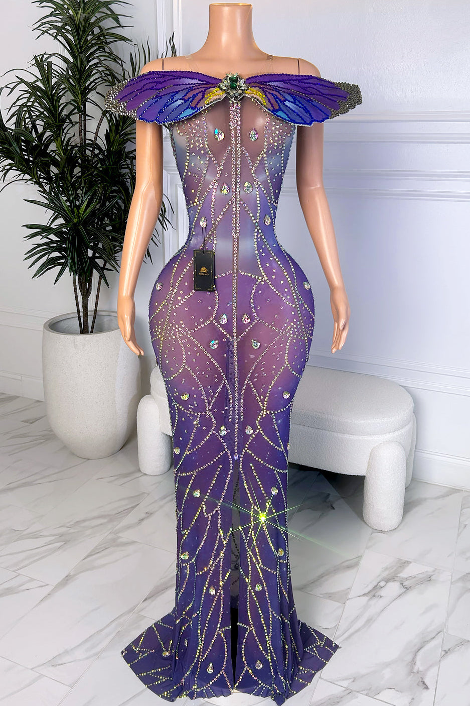 Front view of purple ombre rhinestone gown with illusion bodice, butterfly-inspired collar, and fitted floor-length silhouette